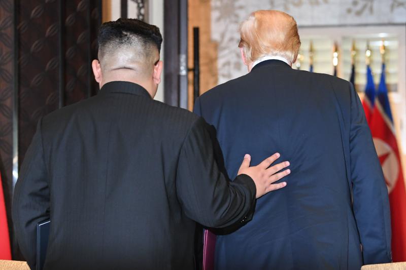 20180612 trump and kim back.jpg