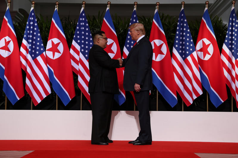 20180612 trump and kim shake hand.jpg