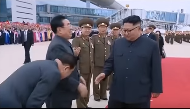 man bow at kim.jpg