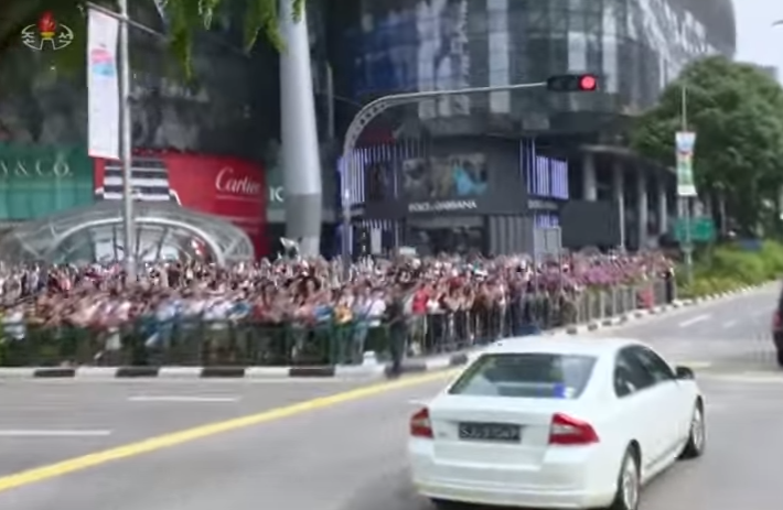 waving crowd at orchard.jpg