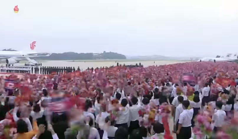 wide shot of crowd cheering at py airport.jpg