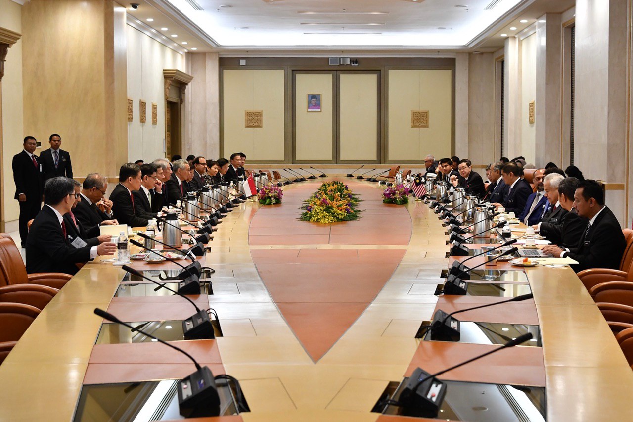 Singapore-Malaysia Leaders' Retreat  PM Lee Hsien Loong, Malaysian PM Mahathir Mohamad and delegation from both countries meet at the Perdana Putra Building ST.jpg