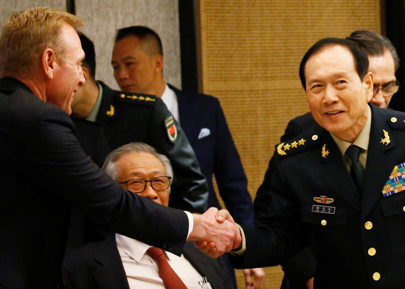 20190603 weifenghe and shanahan and NEH reuters.jpg