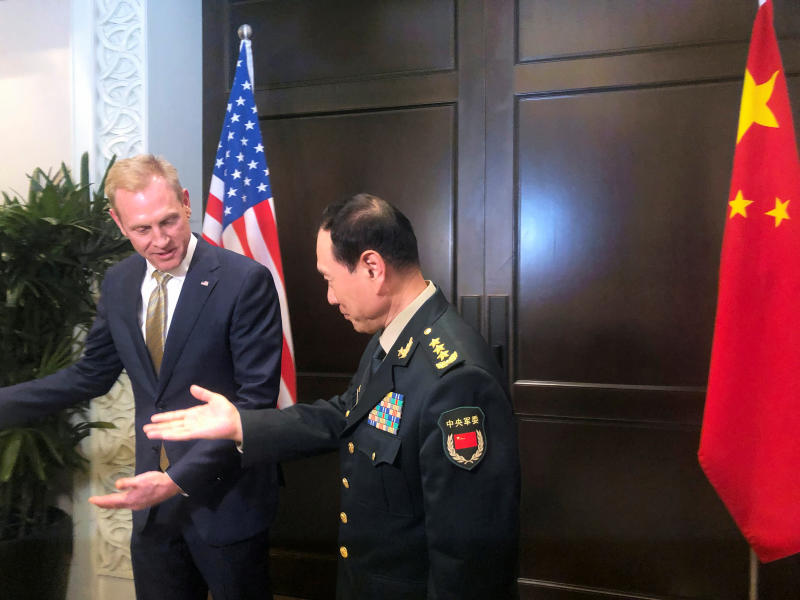 20190603 weifenghe and shanahan reuters.jpg