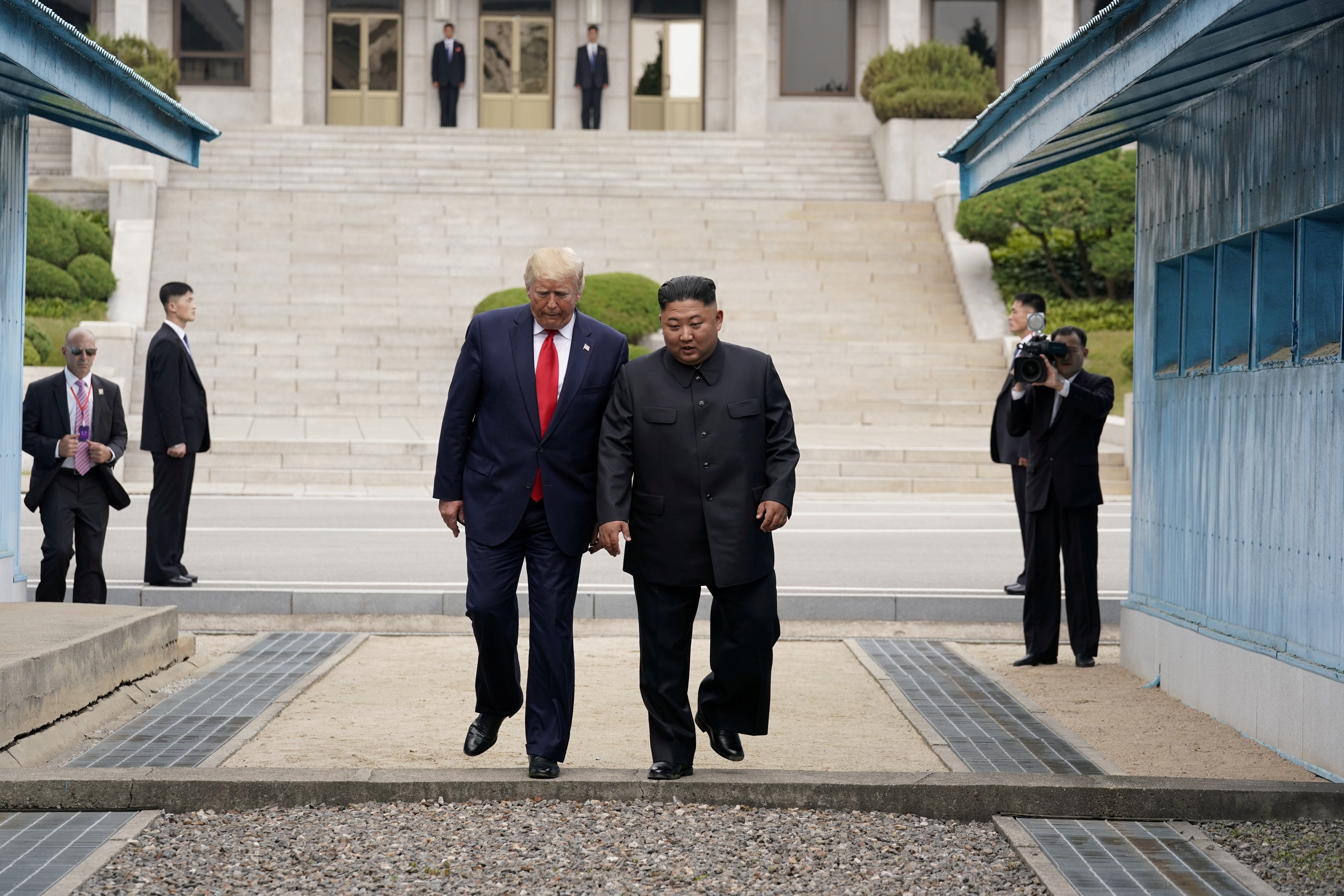 2019-07-01T043335Z_215069118_RC1F0F94CAA0_RTRMADP_3_NORTHKOREA-USA-SOUTHKOREA.JPG