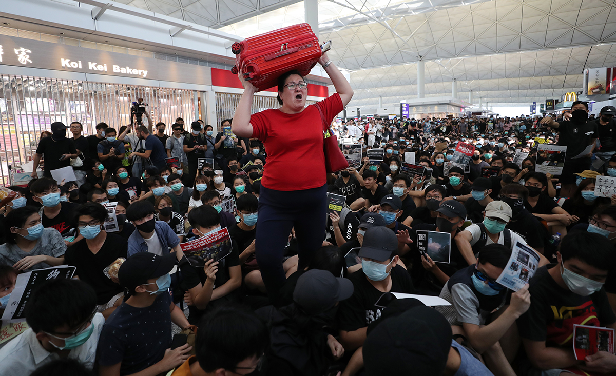 20190815 woman-airport SCMP.jpg