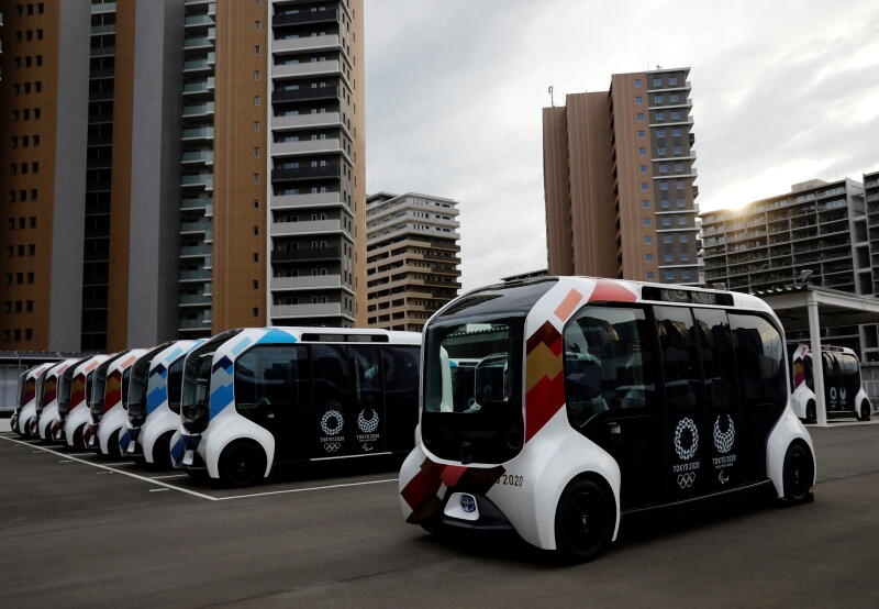 20210622 - Electric vehicles at an internal shuttle bus station (Reuters).jpg